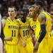 Michigan freshman Nik Stauskas, junior Tim Hardaway Jr., sophomore Jon Horford and freshman Glenn Robinson III huddle in between plays during the second half at Assembly Hall on Saturday, Feb. 2 in Bloomington, Ind. Melanie Maxwell I AnnArbor.com